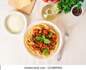 Pasta Bolognese With Tomato Sauce, Ground Minced Beef, Basil Leaves On Background