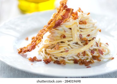 Pasta carbonara with bacon on a plate
