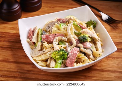 Pasta Chicken Sausage Served In Dish Isolated On Table Side View Of Middle East Food