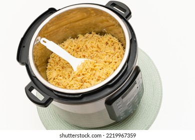 Pasta Cooked In Instant Pot. Delicious Orzo Pasta Close Up In A Pot On White Background With Copy Space