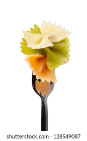 Pasta Farfalle On A Fork. Isolated On A White Background