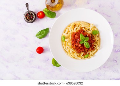 Pasta Fettuccine Bolognese With Tomato Sauce In White Bowl. Flat Lay. Top View