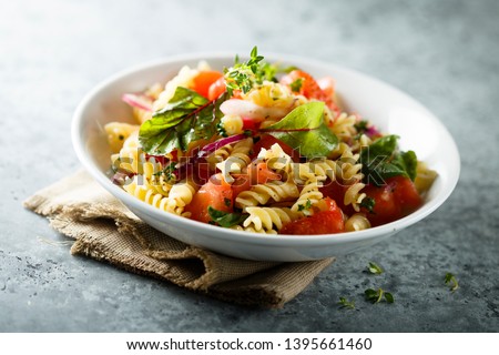 Pasta fresh tomato salad with red onion