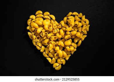 Pasta Heart On Black Background, Flat View