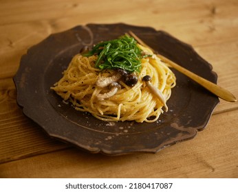 Pasta with a Japanese twist of mentaiko and cream - Shutterstock ID 2180417087