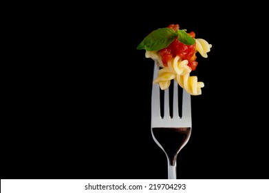 Pasta on black background - Shutterstock ID 219704293