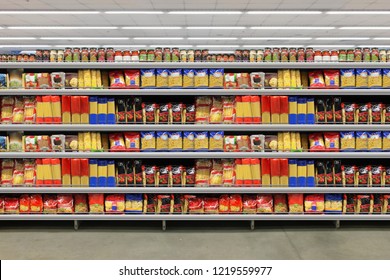 Pasta packing on a shelf in a supermarket. is suitable for presenting new packaging among many others. - Powered by Shutterstock