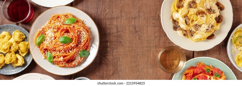 Pasta Panorama. Assortment Of Italian Pastas, With Spaghetti, Mushroom Pasta And Red And White Wine, Overhead Flat Lay Shot On A Rustic Background With Copy Space, For An Italian Restaurant Menu