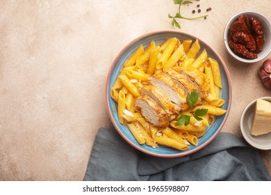 Pasta Penne With Cajun Sauce And Fried Chicken, Top View