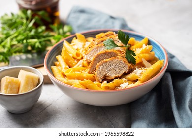 Pasta Penne With Cajun Sauce And Fried Chicken, Close Up