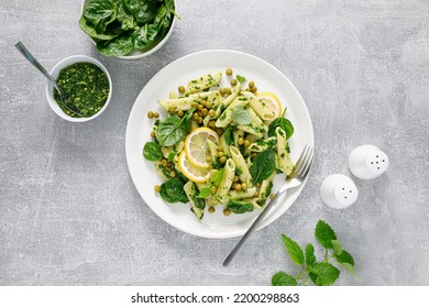 Pasta Penne With Spinach Pesto And Green Peas