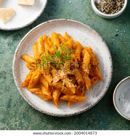 Pasta with roasted pepper sauce and cheese