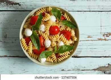 Pasta Salad With Cherry Tomatoes And Basil Leaves