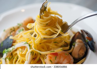 Pasta With Seafood, Fork And Spoon