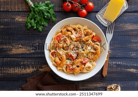 Pasta with shrimps, tomatoes and cheese. Healthy eating. Italian food