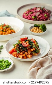 Pasta With Spinach And Chick Peas In Red Sauce