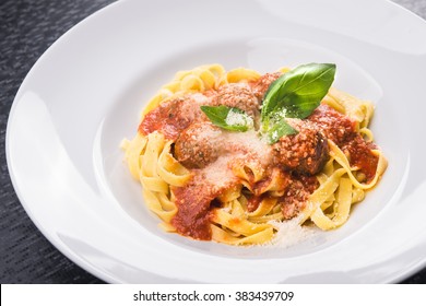 Pasta Tagliatelle With Meat Balls On White Plate