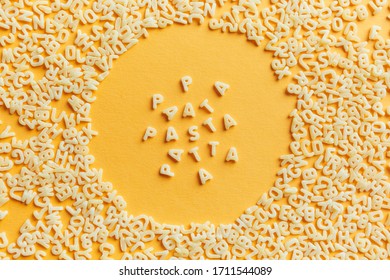 Pasta Text Of Macaroni Letters In A Round Macaroni Frame On A Yellow Background