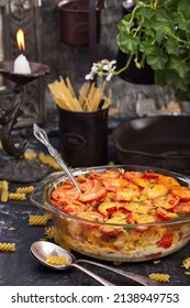 Pasta With Tomatoes Sizzle. Food Photography, Dark Background