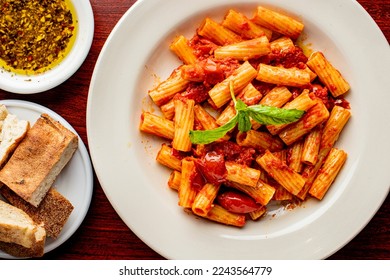 Pastas. Pasta with mushrooms, onions, garlic, pork, cheese, egg, bacon, pepper and Italian parsley. Classic American or Italian restaurant favorite. Homemade pasta with butter, meat and cheese. - Powered by Shutterstock