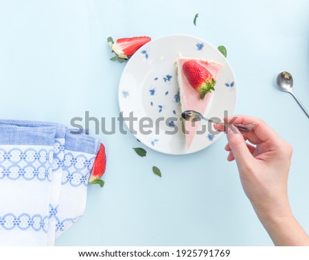 Similar – Hand holding a child’s plate of fresh fruit. Top view.