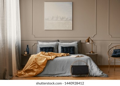 Pastel Blue Painting On Grey Wall Of Trendy Bedroom Interior