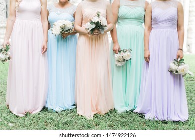 Pastel Bridesmaids Dresses, Bridesmaids Holding Bouquets, Pink, Peach, Blue, Mint And Purple Gowns