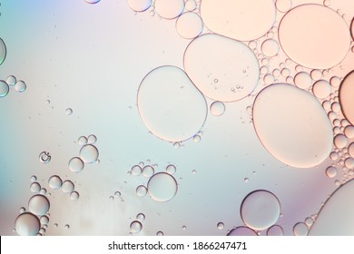 Pastel Color Artistic Of Oil Drop Floating On The Water. Pastel Color Bubble For Background. Abstract Oil Bubbles Background. Macro Shot . Bubbles Close Up.Bright And Unique Oil Drops, Circles On The.