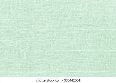 Pastel Color Of Sea Concept: Light Grayish Lime Green Fabric Wallpaper Texture Background.