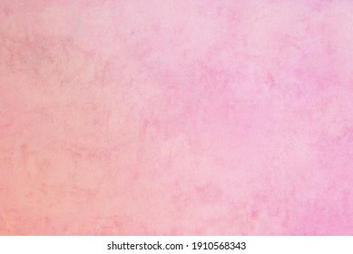 Pastel colored background, pink and orange, warm painted colors 
