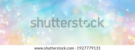 Pastel colored banner of abstract sparkling lights in a cosmic field of  pure energy with plenty of copy space for individual text and design