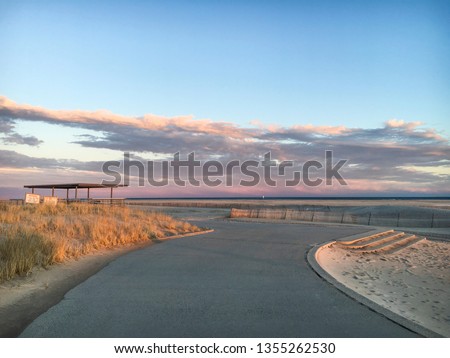 A pastel colored sky as the sun sets over Jones Beach State Park in Wantagh, NY.