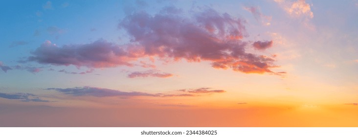 Pastel colors of Majestic real sky with sun - Panoramic Sunrise Sundown Sanset Sky with colorful clouds. Without any birds.  Natural Cloudscape. Large panorama