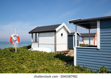 Pastel Coloured Beach Huts At Skanör Beach, South Of Sweden.