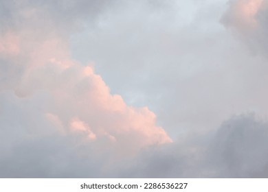 fluffy coloured clouds background