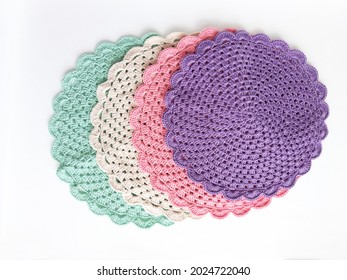 Pastel Crochet Doilies on white background, napkin doily, knitted cloth table