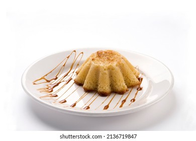 Pastel De Elote Con Cajeta, Corn Pie With Burnt Milk On A Plate On White Background