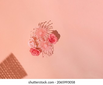 Pastel Exotic Flowers, Basket Silhouette Creative Layout Against Pastel Pink Background. Summer Day Mood.