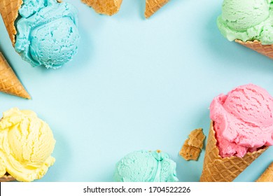 Pastel ice cream in waffle cones, bright background, copy space - Shutterstock ID 1704522226