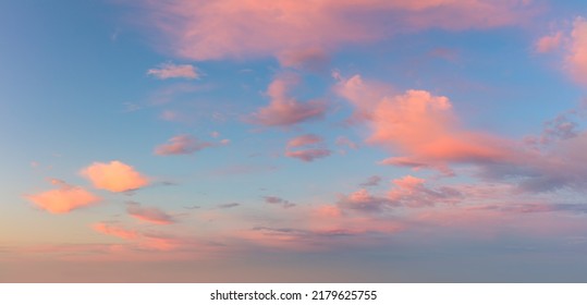 Pastel light cirrus clouds in the blue sky during dawn sunset sunrise, sky background - Shutterstock ID 2179625755