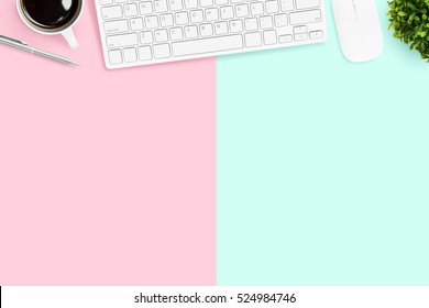 Pastel Office Desk Table With Computer Gadgets, Coffee And Pen. Top View With Copy Space, Flat Lay.