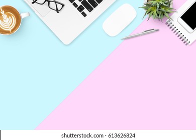 Pastel office desk table with laptop computer and supplies. Top view with copy space, flat lay. - Powered by Shutterstock