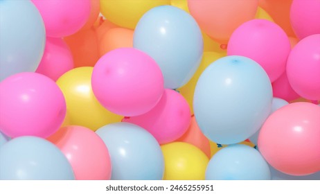 Pastel party balloons floating in the air - Powered by Shutterstock