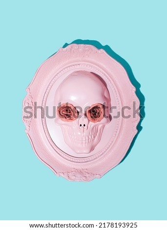 Pastel pink human skull, creative vintage style frame. Goth style portrait. Horror inspired. 