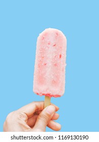 Pastel Pink Ice Cream Popsicle Ice Bar Over A Pastel Baby Blue Background