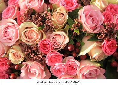 Pastel roses in different shades of pink in a bridal arrangement - Shutterstock ID 452629615