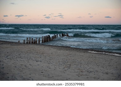 Pastel sunset over Lake Superior with sandy beach and - Powered by Shutterstock