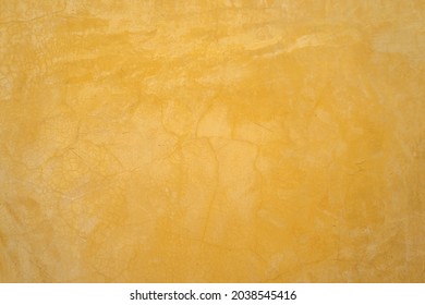 Pared cemento mostaza amarillo