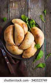 pasties filled with meat and vegetables, top view - Shutterstock ID 340323749
