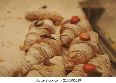 Pastries, Rolls And Bread  Inside Of A Bakery Case 